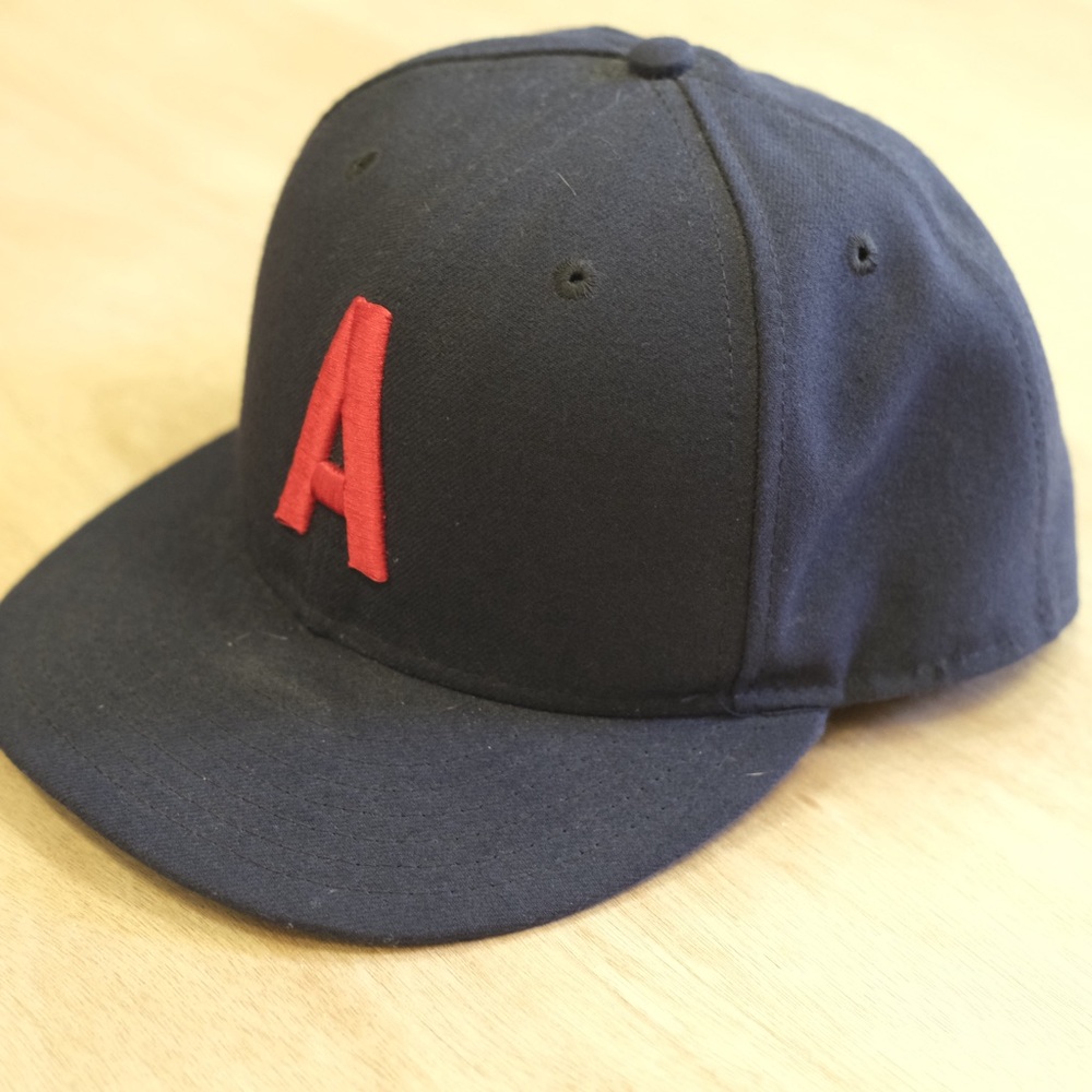 New Era Navy Cap with Red Lettering